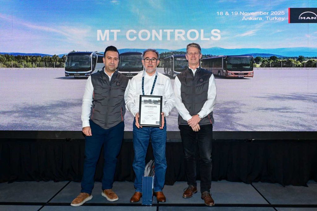 Osman Coban, employee of Move & Traffic Controls at MAN in Turkey, with two colleagues